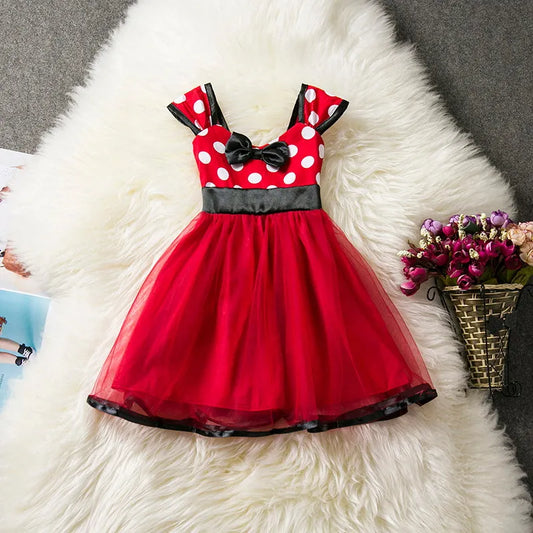 Vestido de tul rosa con lunares y ribete dorado para niña 