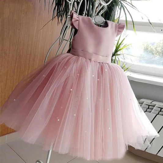 Vestido de tul rosa sin mangas para niñas con lazo grande y hombros con volantes 