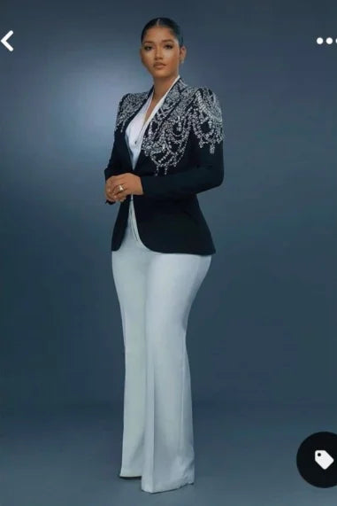 Elegante chaqueta con cuentas de cristal para mujer, solapa con pico, largo completo, conjunto de 2 piezas, blazer negro ajustado y pantalón blanco.