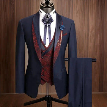 Men's Navy Blue Three Piece Suit with Red Paisley Vest and Stylish Accessories