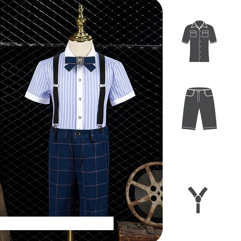 Conjunto de traje formal para niño con blazer a cuadros azul marino, chaleco y pantalón, pajarita y prendedor de solapa. 