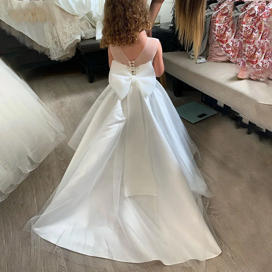 Girls White Sleeveless Flower Girl Dress with Bow Detail